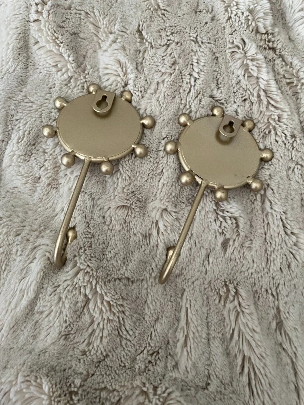 Wild Sage sunflower gold-toned decorative wall hooks with a carved wood accent